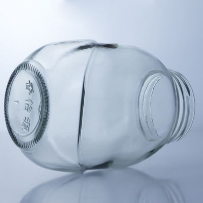 Duidelijke ronde glazen pot voor de behandeling van decale oppervlakken in voedselproductieoplossingen
