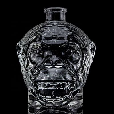 Uniek ontwerp 500 ml 750 ml aapkopvormige glazen fles voor wodka drank met kurk
