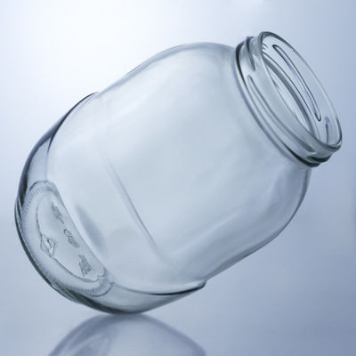 Duidelijke ronde glazen pot voor de behandeling van decale oppervlakken in voedselproductieoplossingen