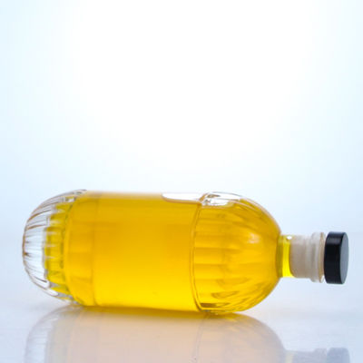 Glasfles voor industriële dranken met geïmprimeerd ontwerp en een ronde vorm van kurk
