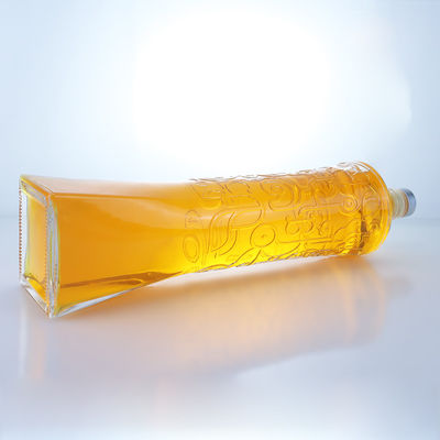 Industriële drankglasfles met een unieke vorm en geïmprimeerd superklein materiaal