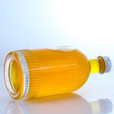 Industriële drankglasfles met schroefkapstrips en aangepast logo