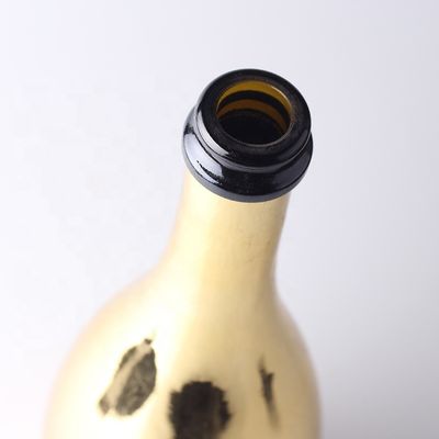 Op maat gemaakte gouden champagneglasflessen met plastic dop voor glasmateriaal